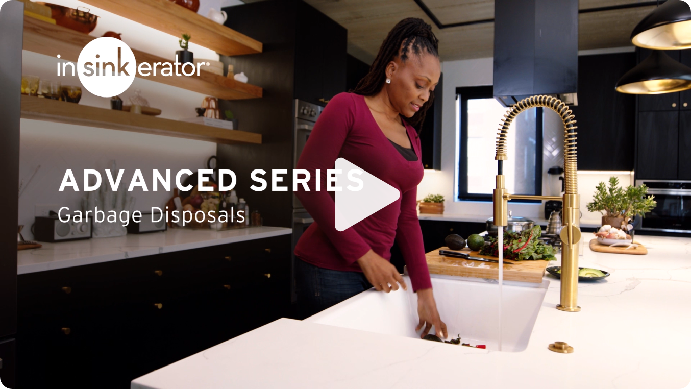 InSinkErator Advanced Series - woman placing the food waste in the sink